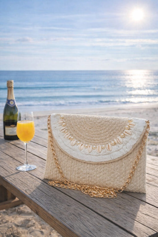 Ivory handcrafted Sling Clutch with Shell Detailing