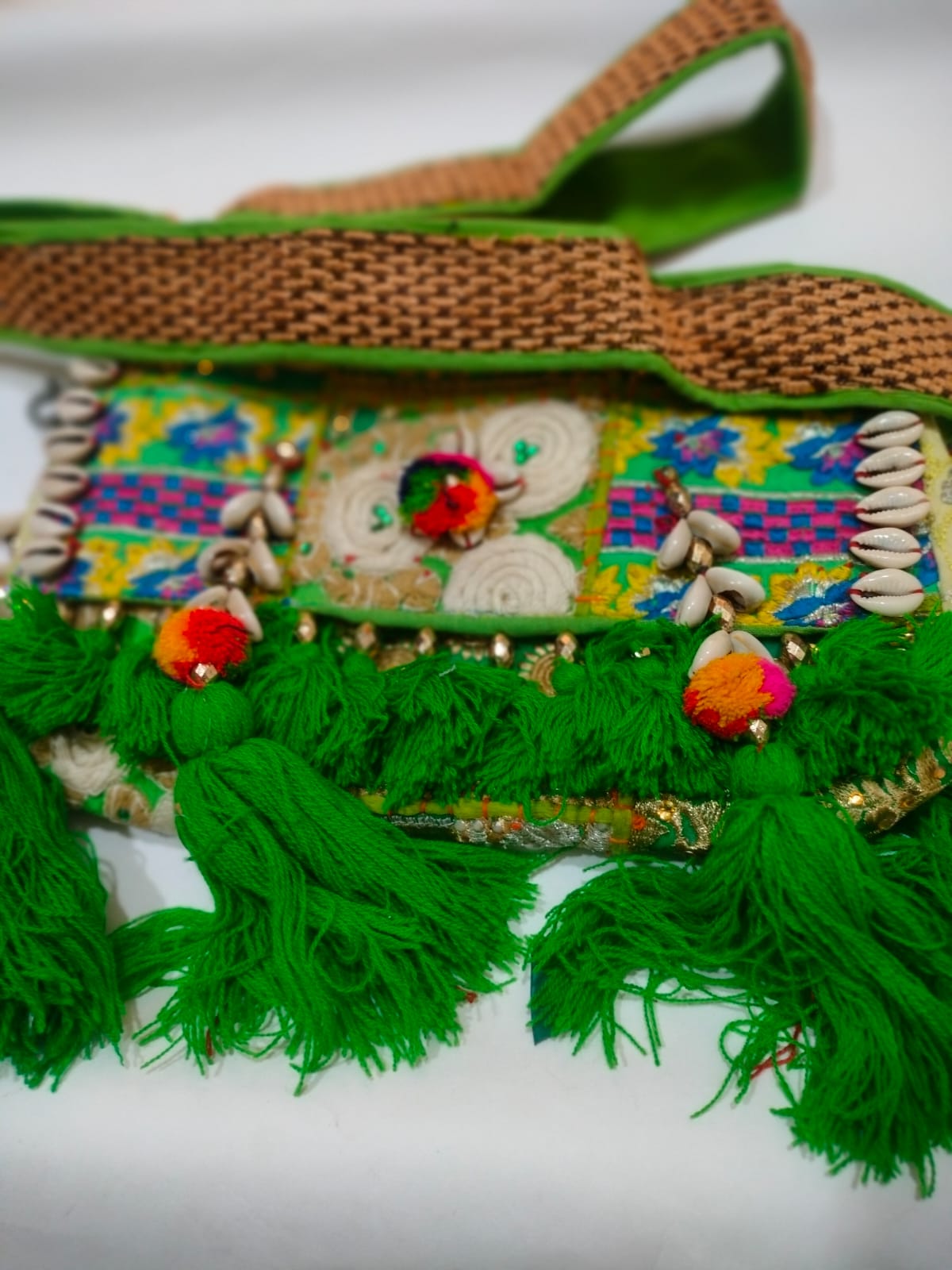 Green Patchwork Embroidered Banjara Sling Bag with Shells & Long Tassels
