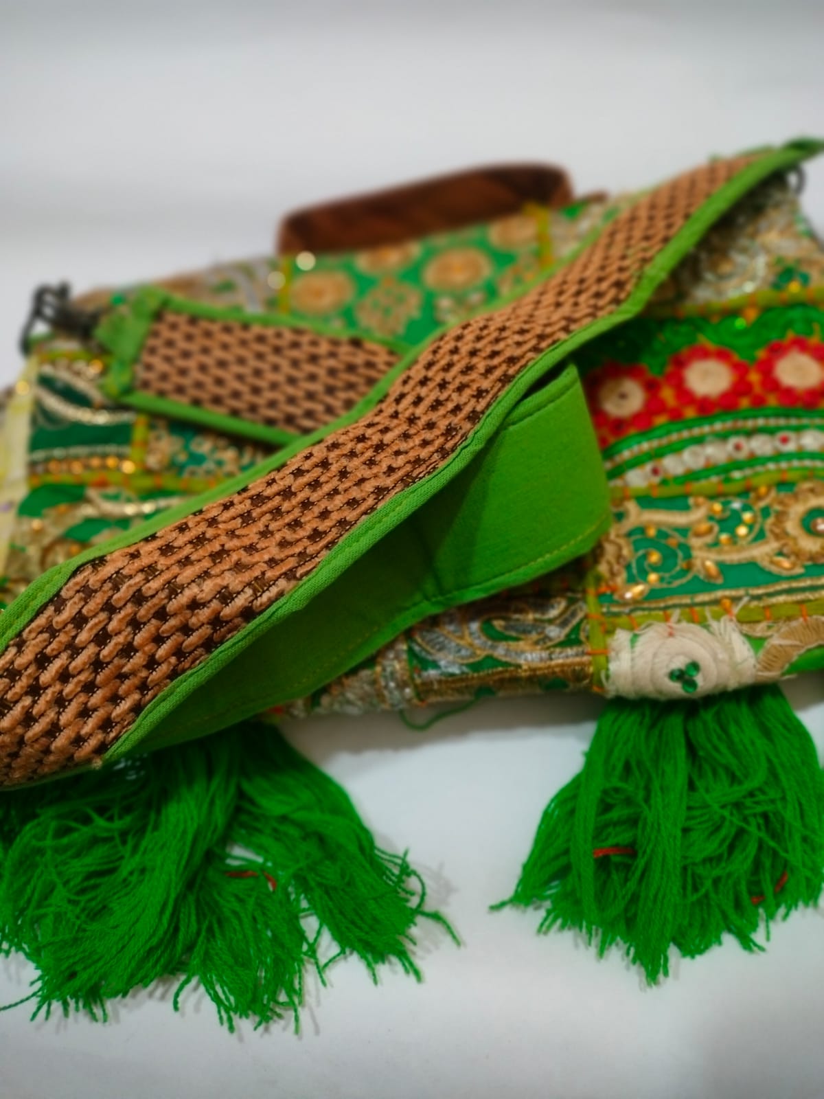Green Patchwork Embroidered Banjara Sling Bag with Shells & Long Tassels